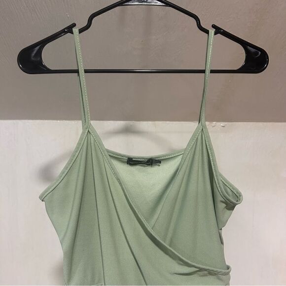 PrettyLittleThing Sage Green Crepe Strappy Wrap Romper - Picture 4 of 7